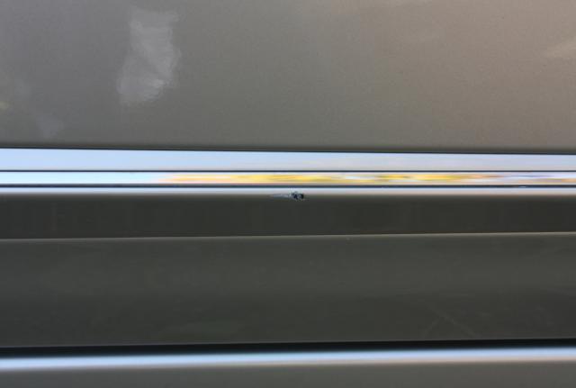 Ťukanec na ochranné liště PP dveří